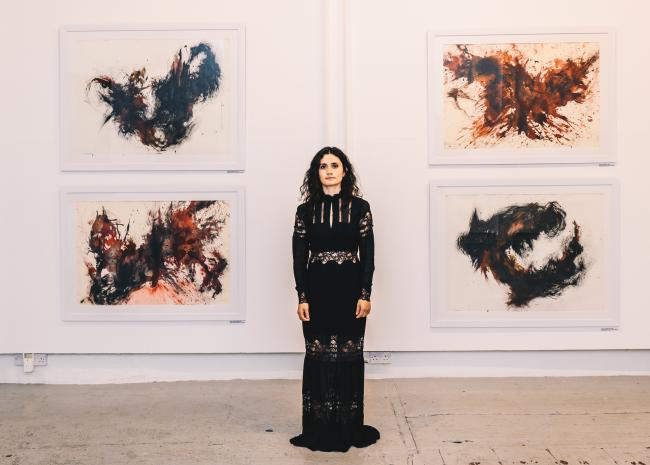 chantal in front of paintings